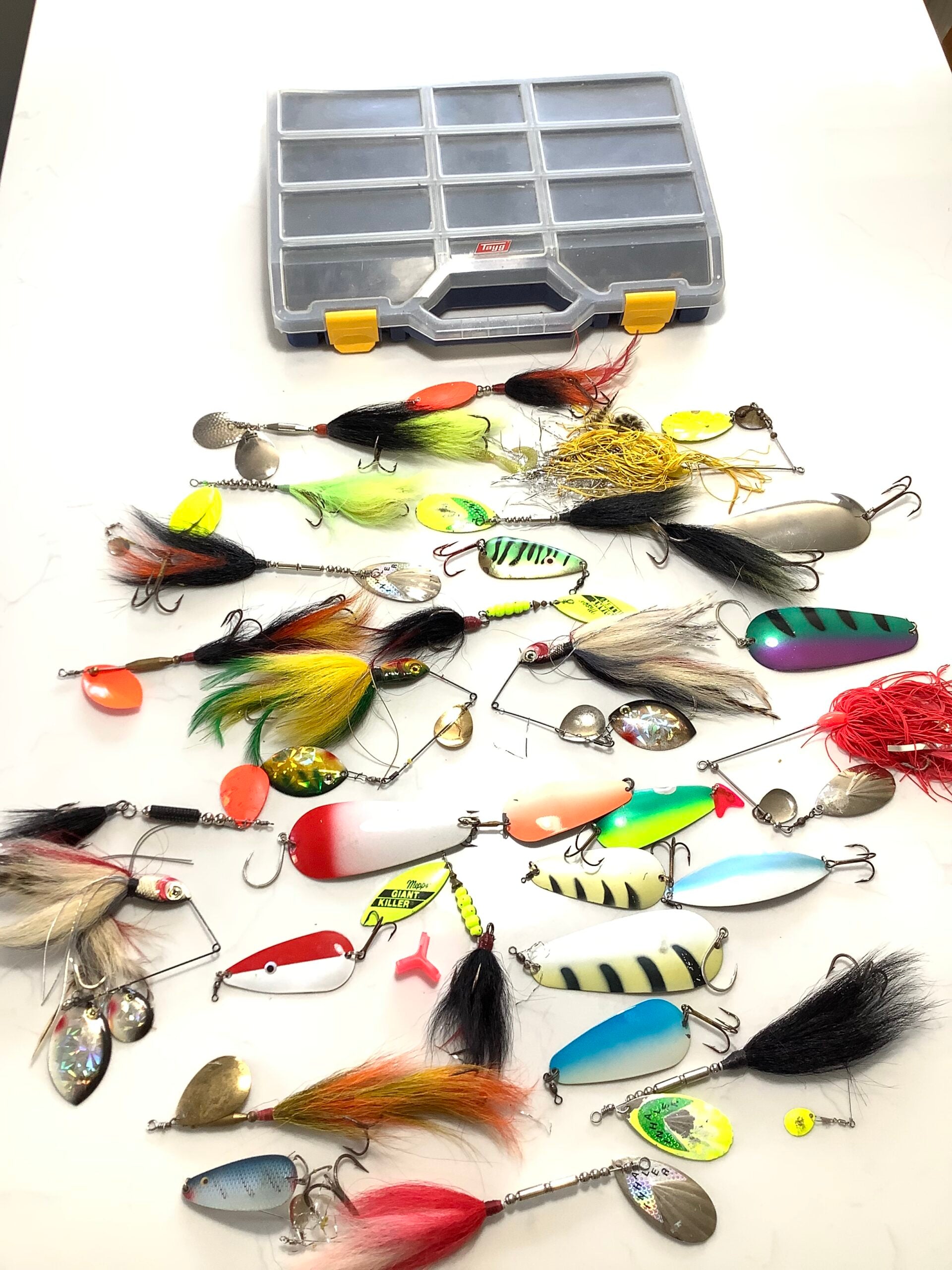 A selection of Large Pike spinners, spinnerbaits and bucktails, spoons, with box.