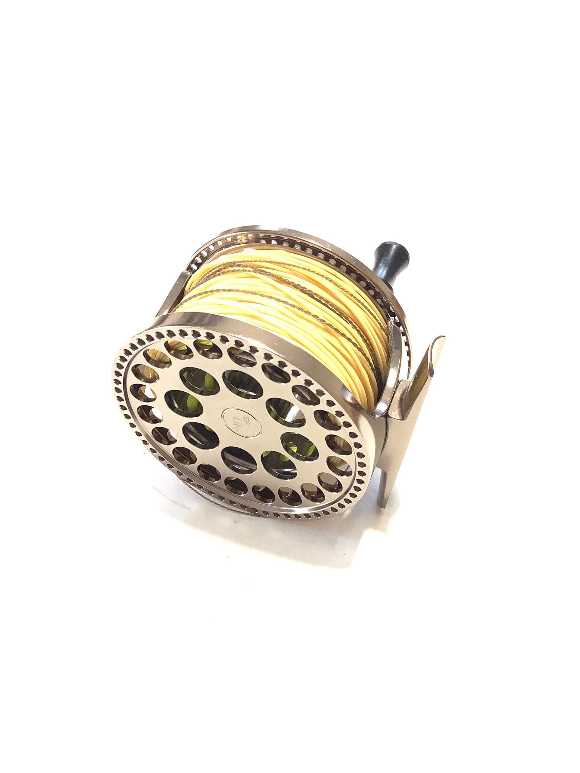 SONIK SK LITE FLY REEL # 3/4 with new line.