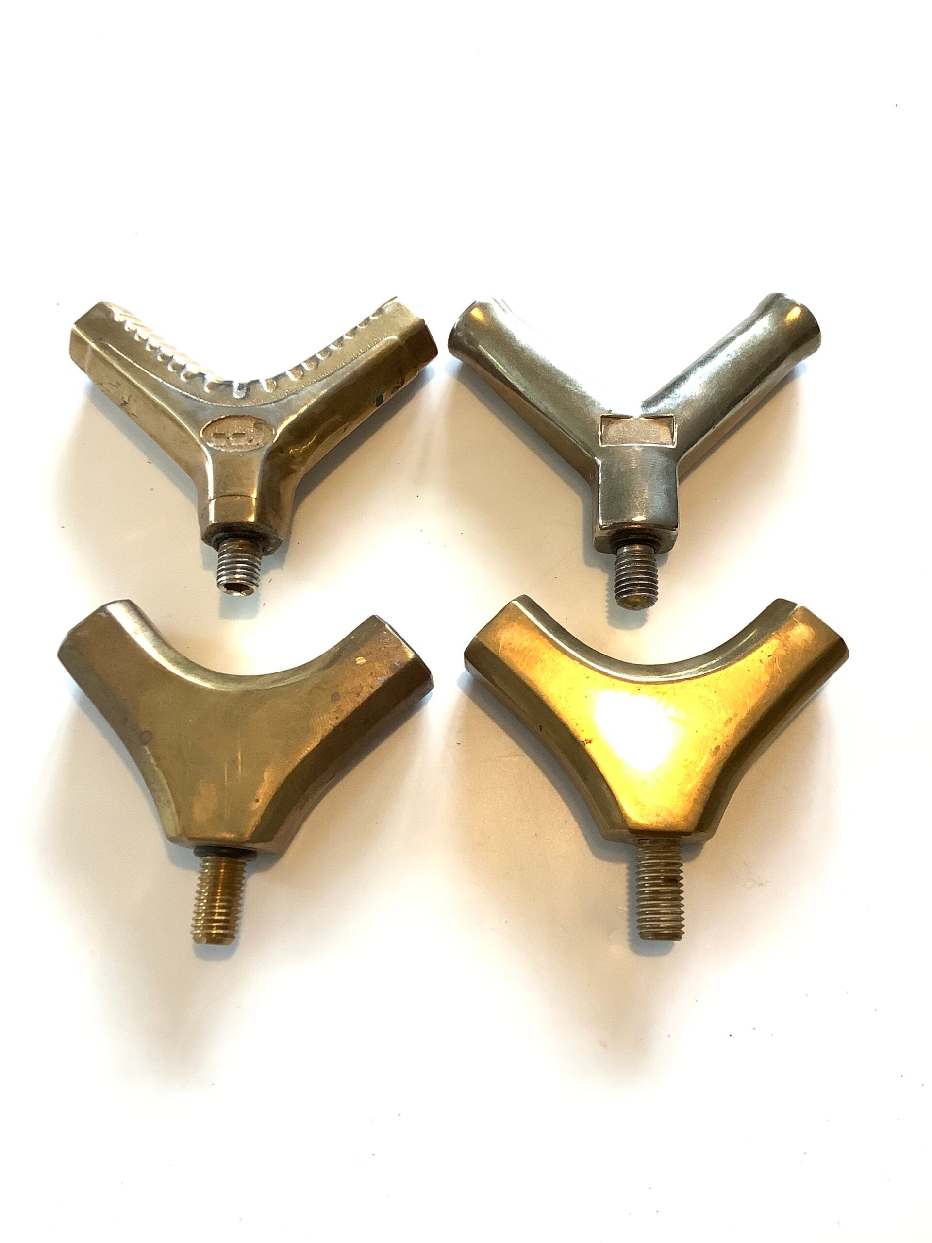 Four Landing Net Brass Spreader Blocks.