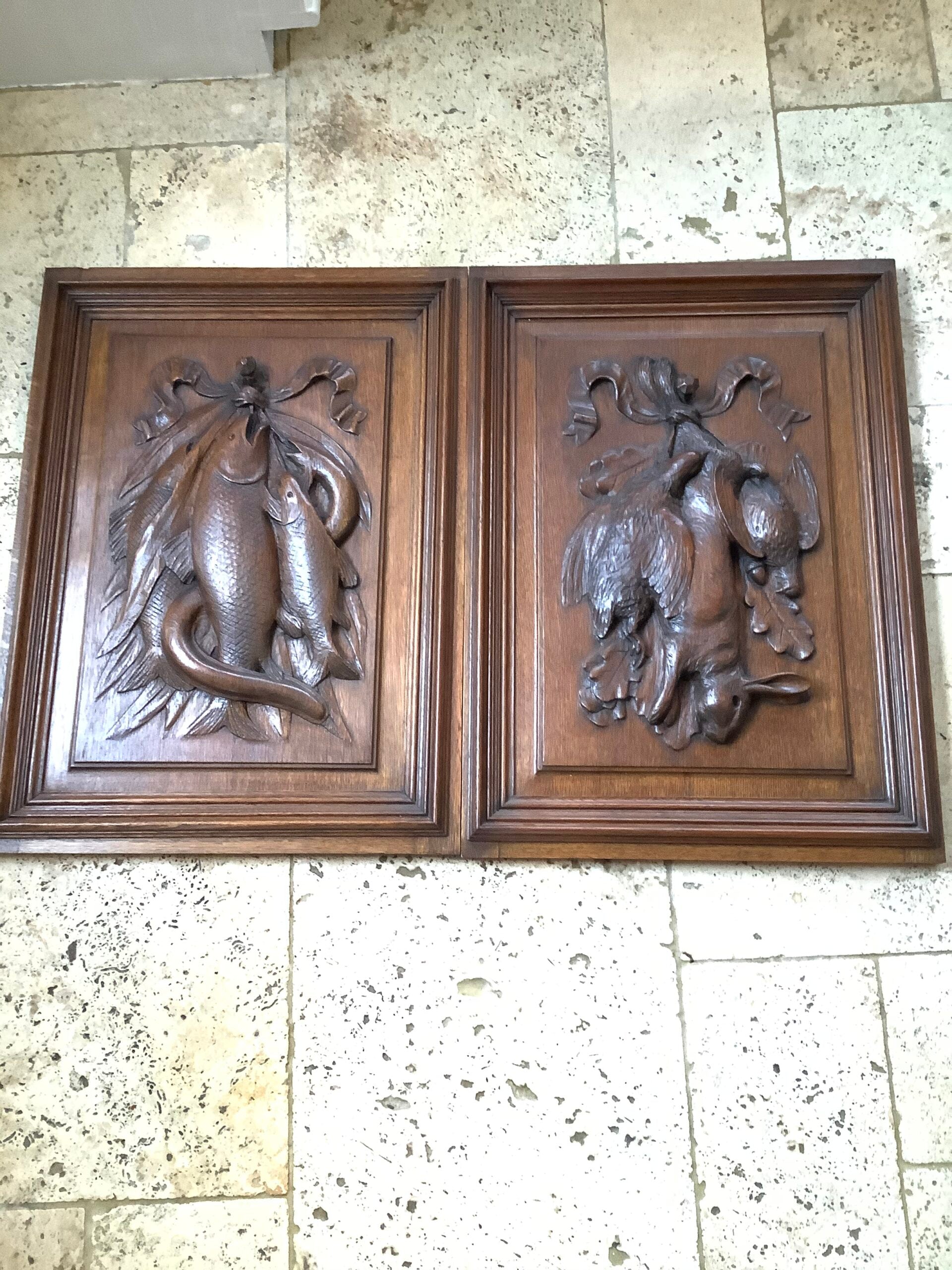 A stunning Antique Handcarved Hunting quarry set on an Oak framed Panel