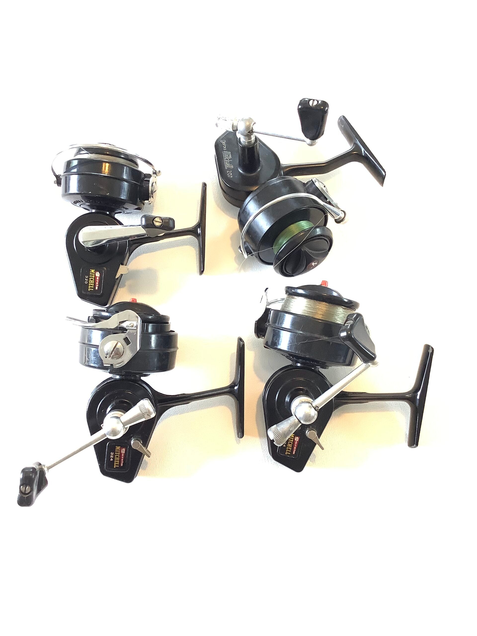 Four Vintage Mitchell Reels in good condition