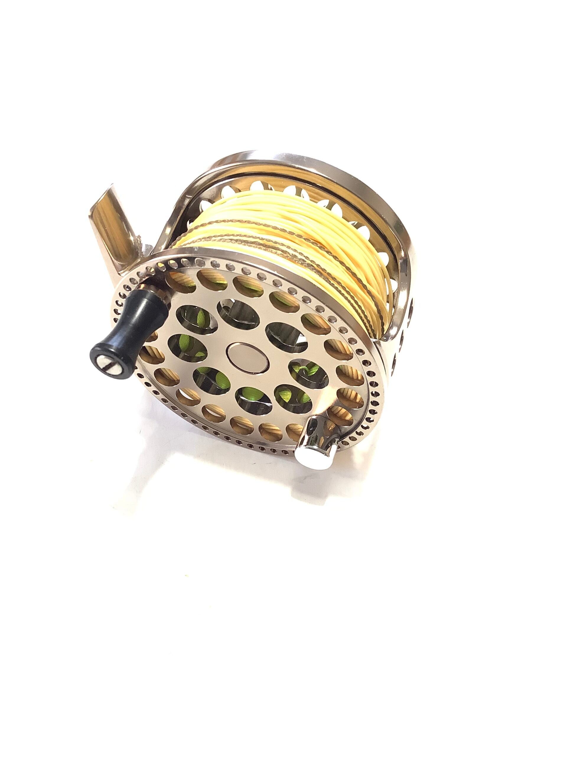 SONIK SK LITE FLY REEL # 3/4 with new line.