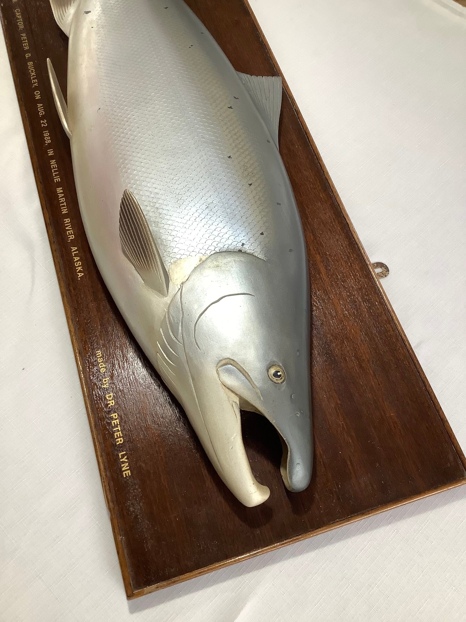 A Half Block Wood Carved Salmon on a Mahogany’s Display Board