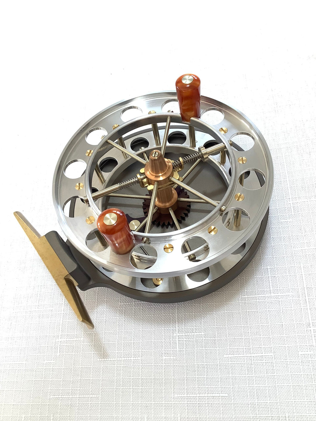 A presentation Boxed CHRIS LYHTE ROACH CENTREPIN WITH SPARE SPOOL