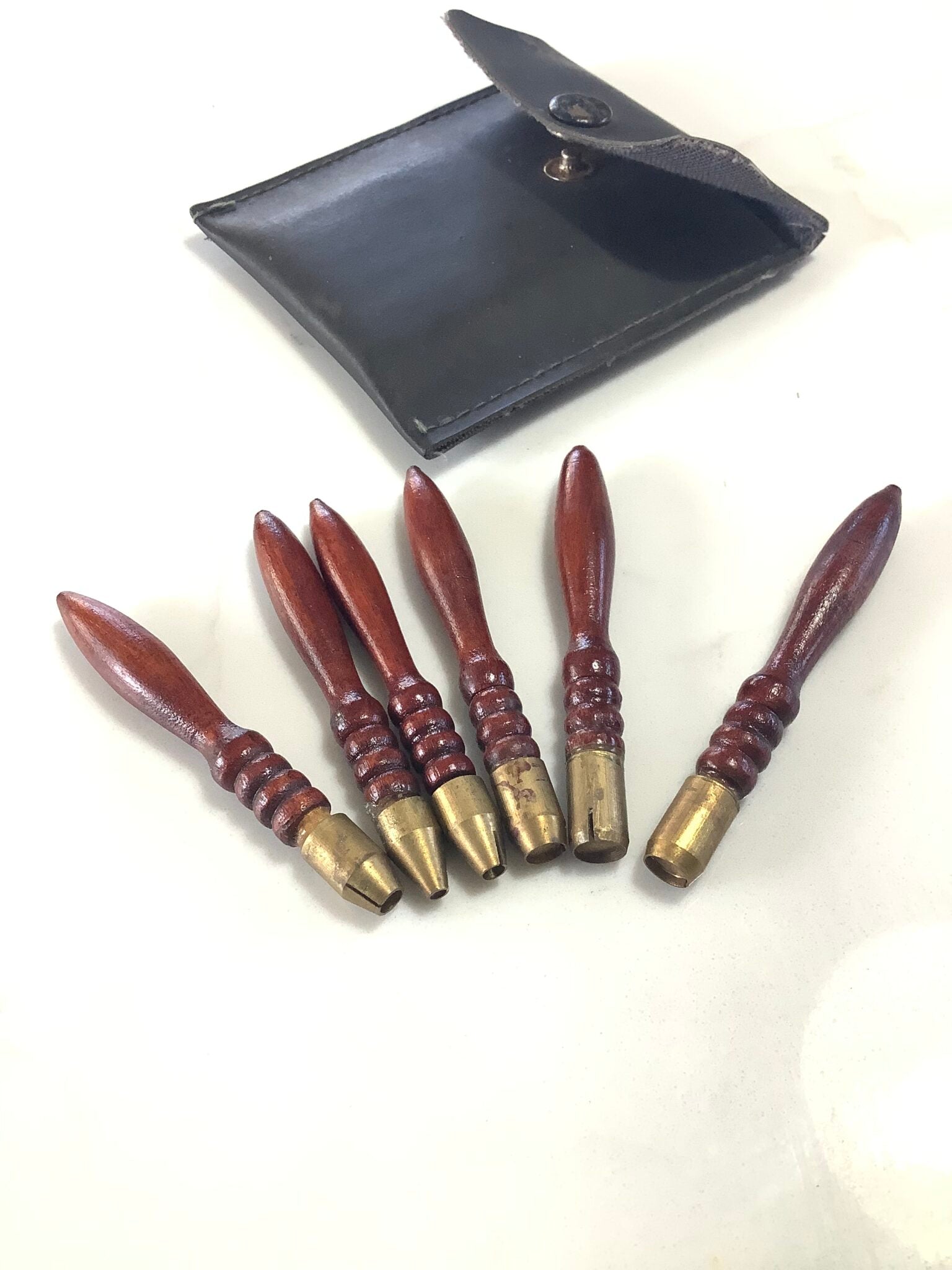 Vintage Cased set of Turned Hardwood Brass Bread punches