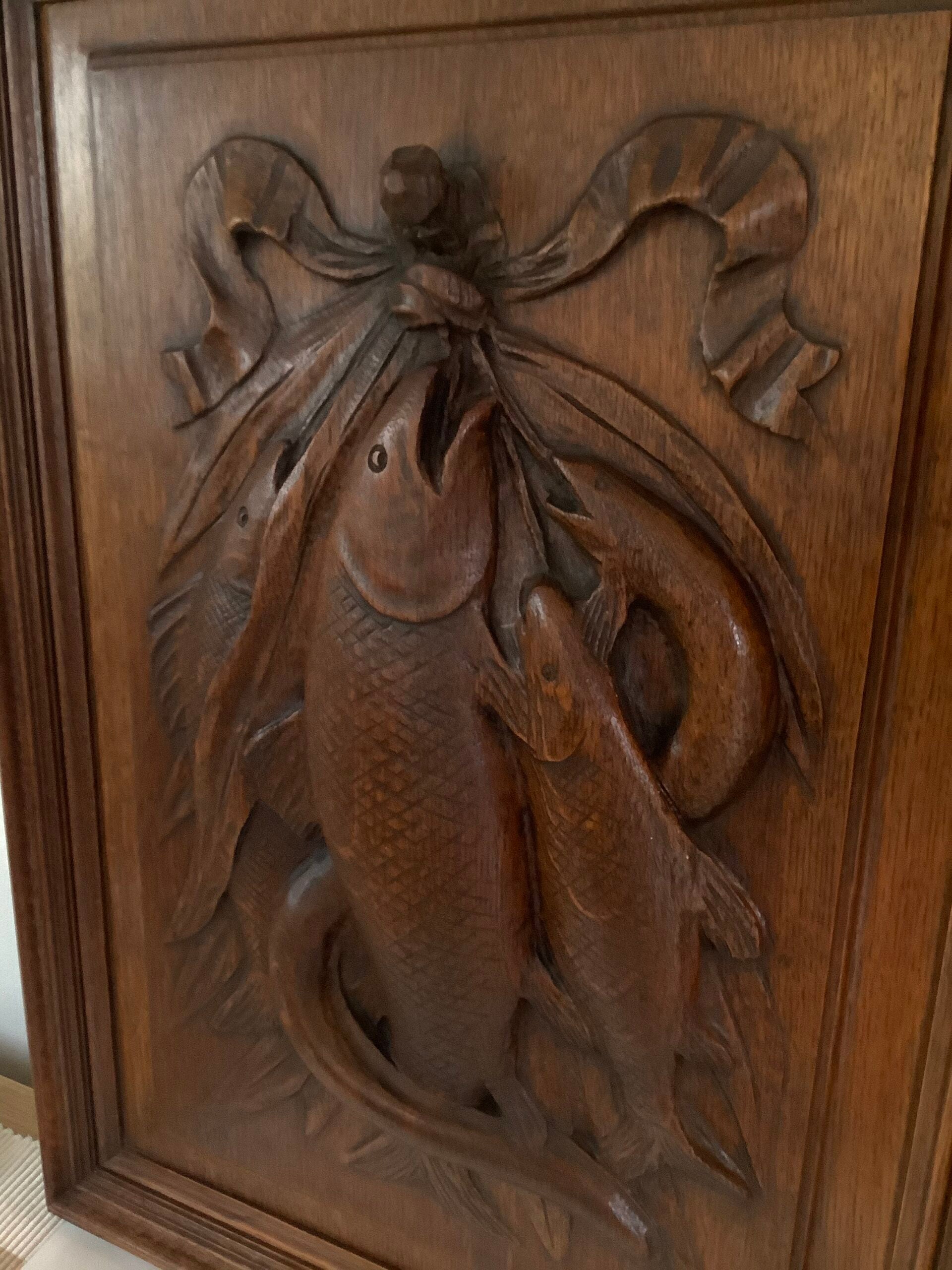 Stunning Antique Hardwood carved fishes on an Oak panel