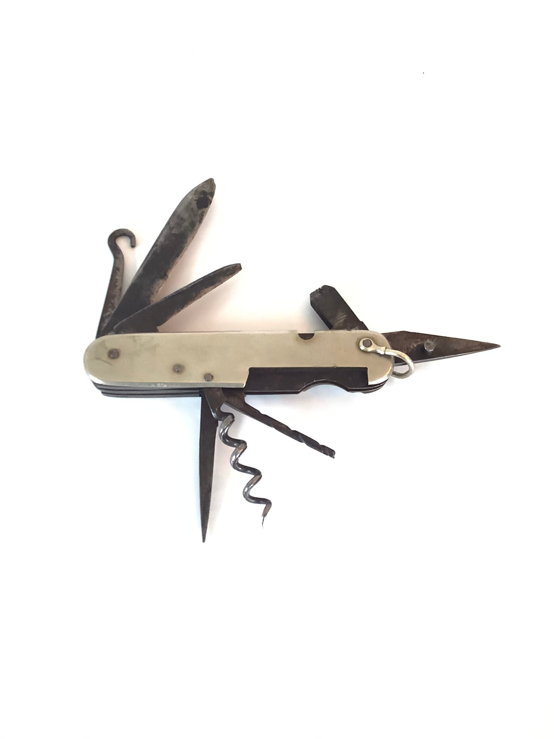 Antique multi tooled pocket knife