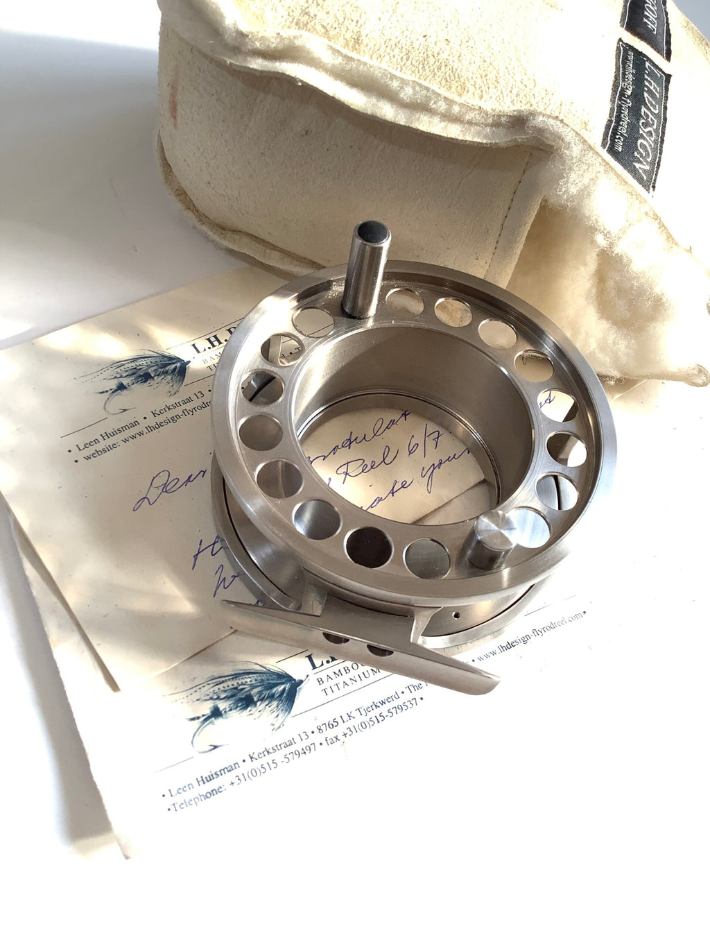Rare L.H.DESIGN “ The  HIGHLANDER “ TITANIUM Hubless FLY REEL Superb..
