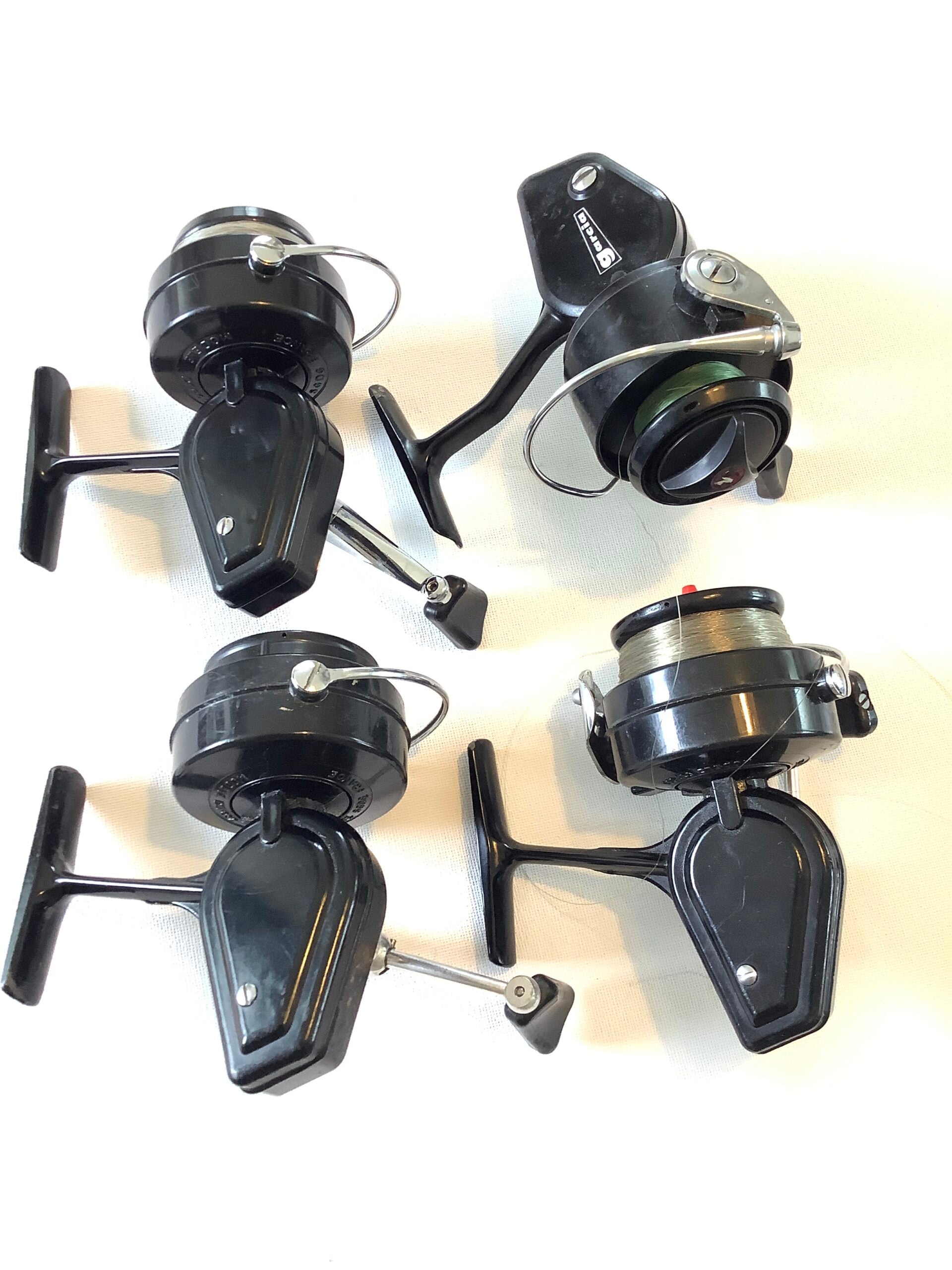 Four Vintage Mitchell Reels in good condition