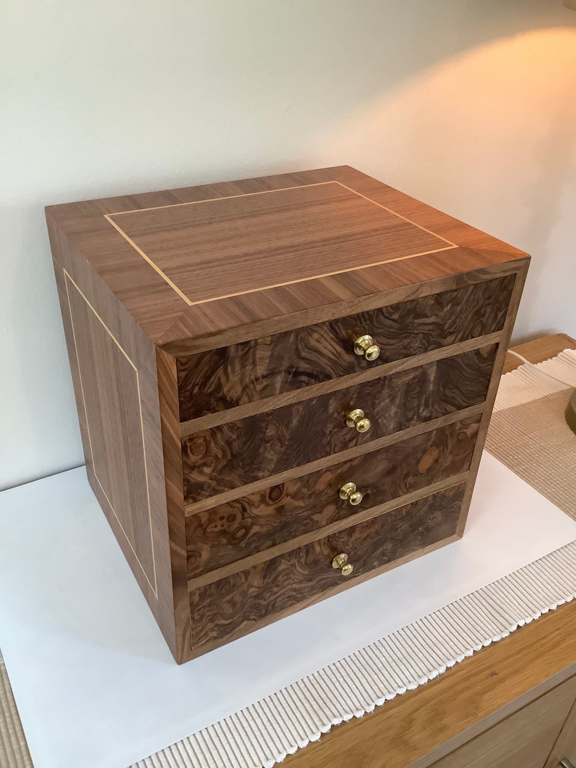 A bespoke hand crafted oak walnut veneered collectors cabinet