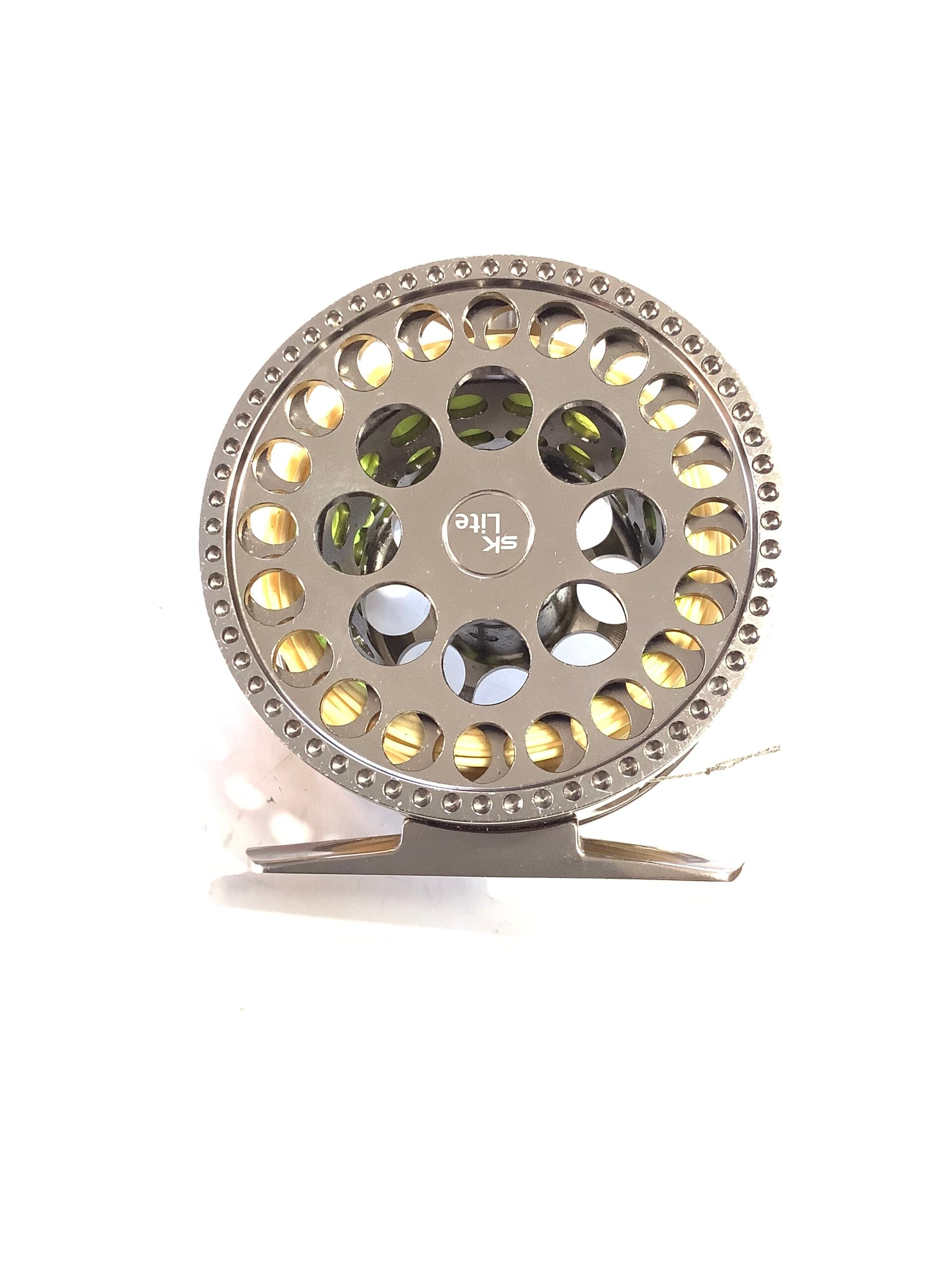 SONIK SK LITE FLY REEL # 3/4 with new line.
