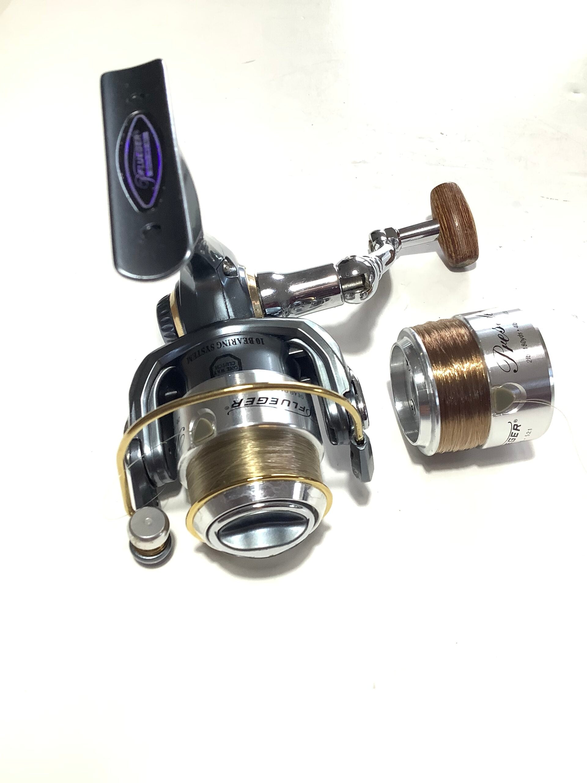 PFLEUGER President Fixed spool Reel