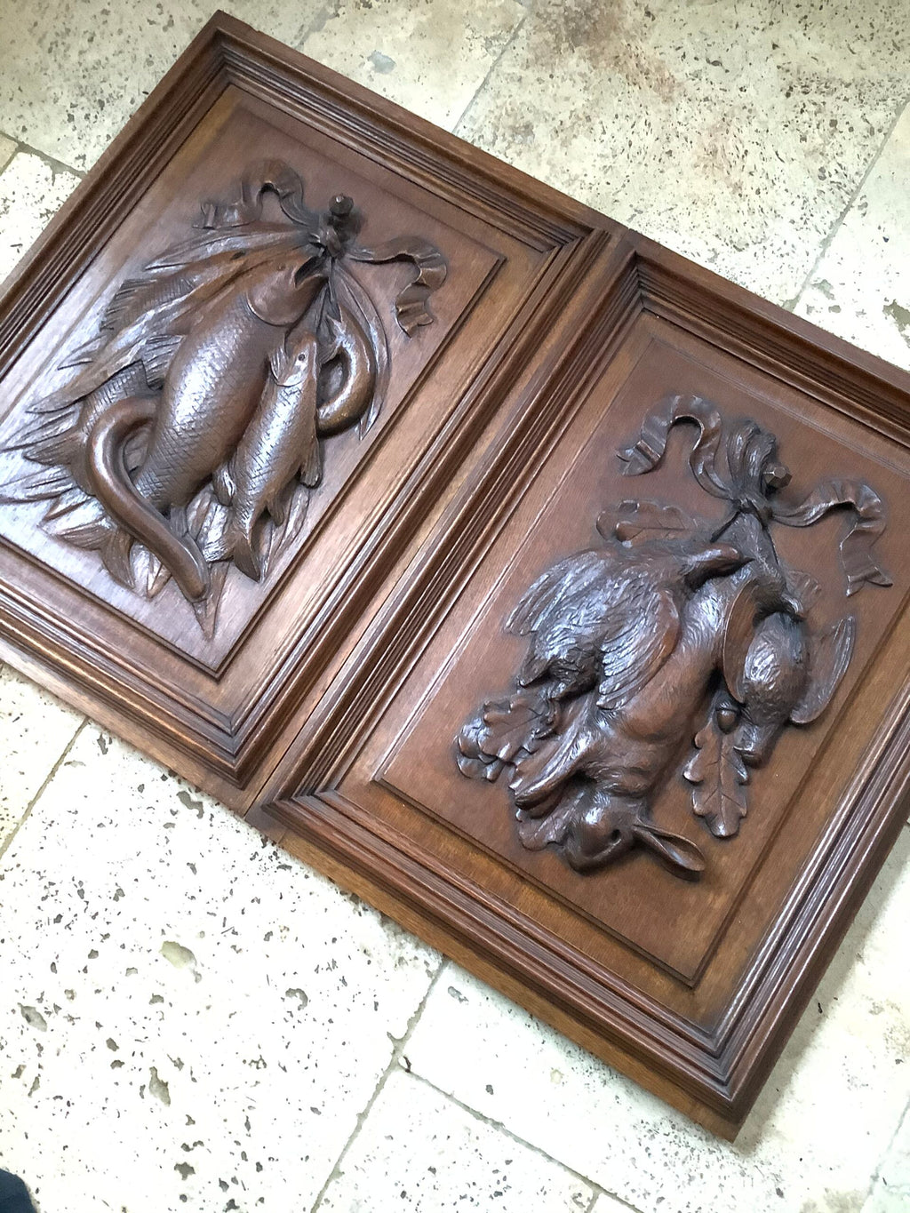 A stunning Antique Handcarved Hunting quarry set on an Oak framed Panel