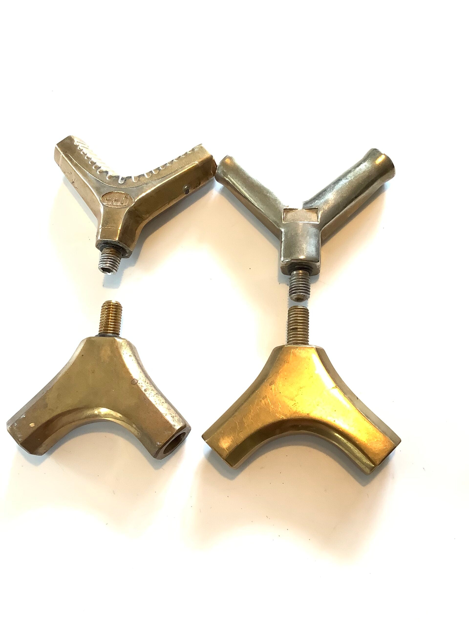 Four Landing Net Brass Spreader Blocks.