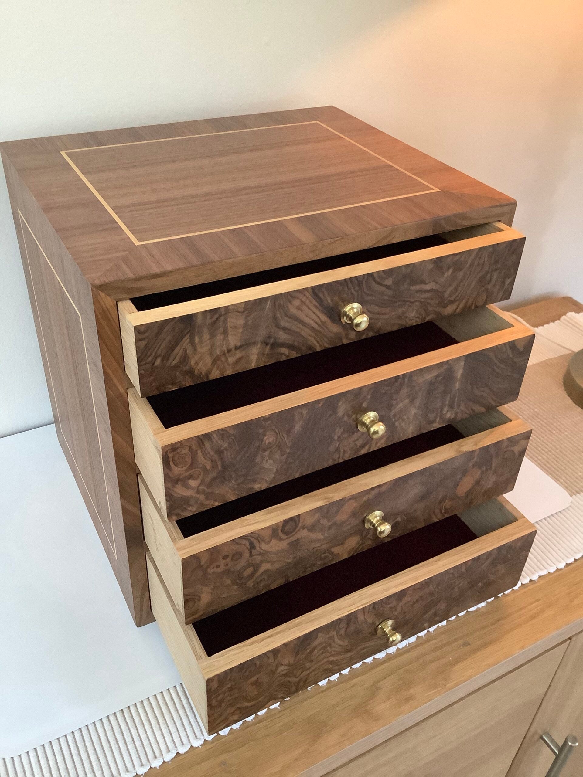 A bespoke hand crafted oak walnut veneered collectors cabinet