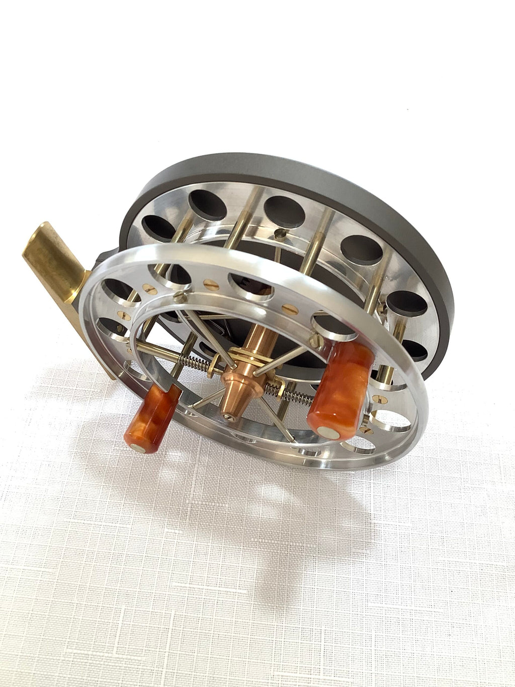 A presentation Boxed CHRIS LYHTE ROACH CENTREPIN WITH SPARE SPOOL
