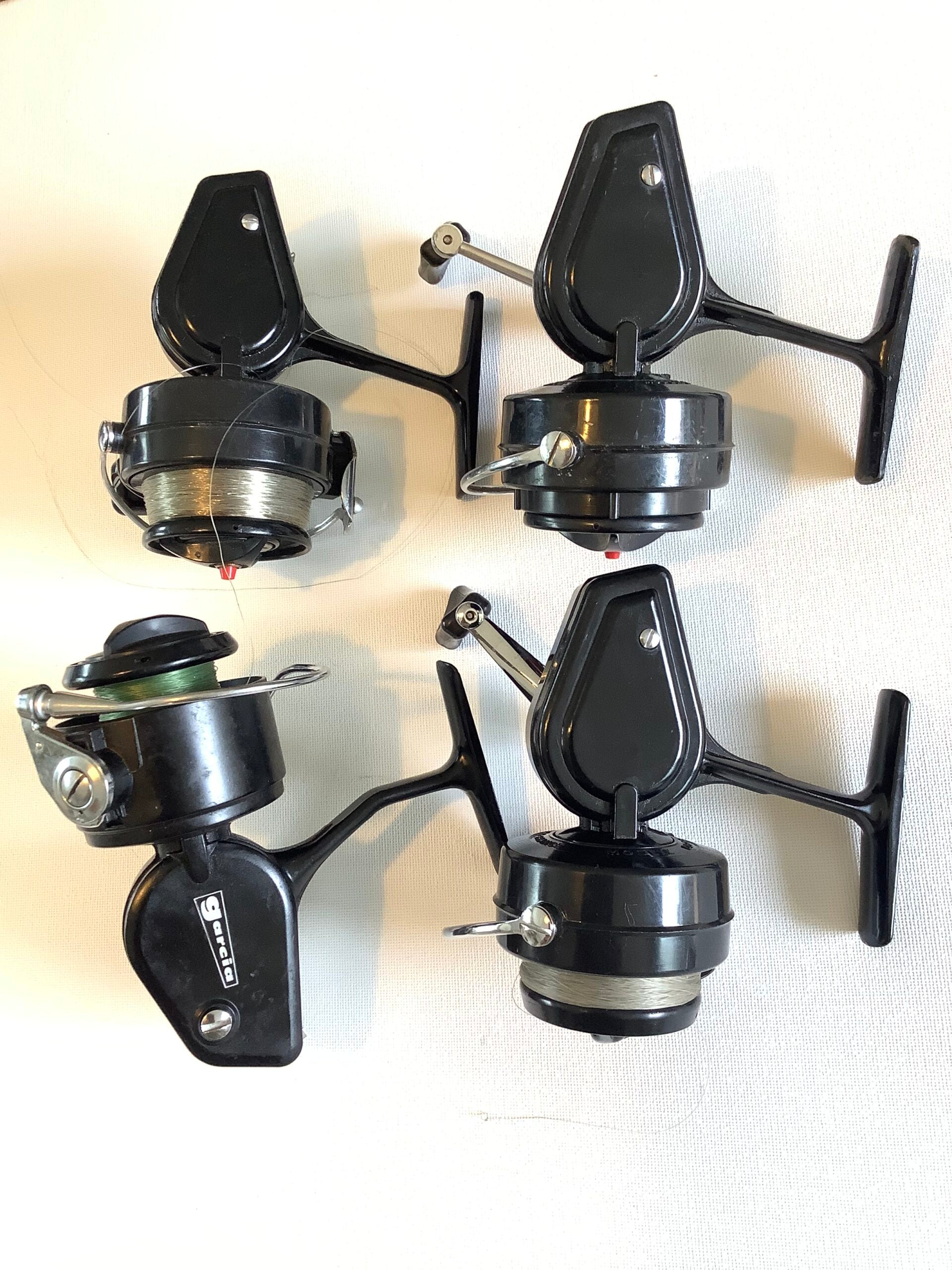 Four Vintage Mitchell Reels in good condition