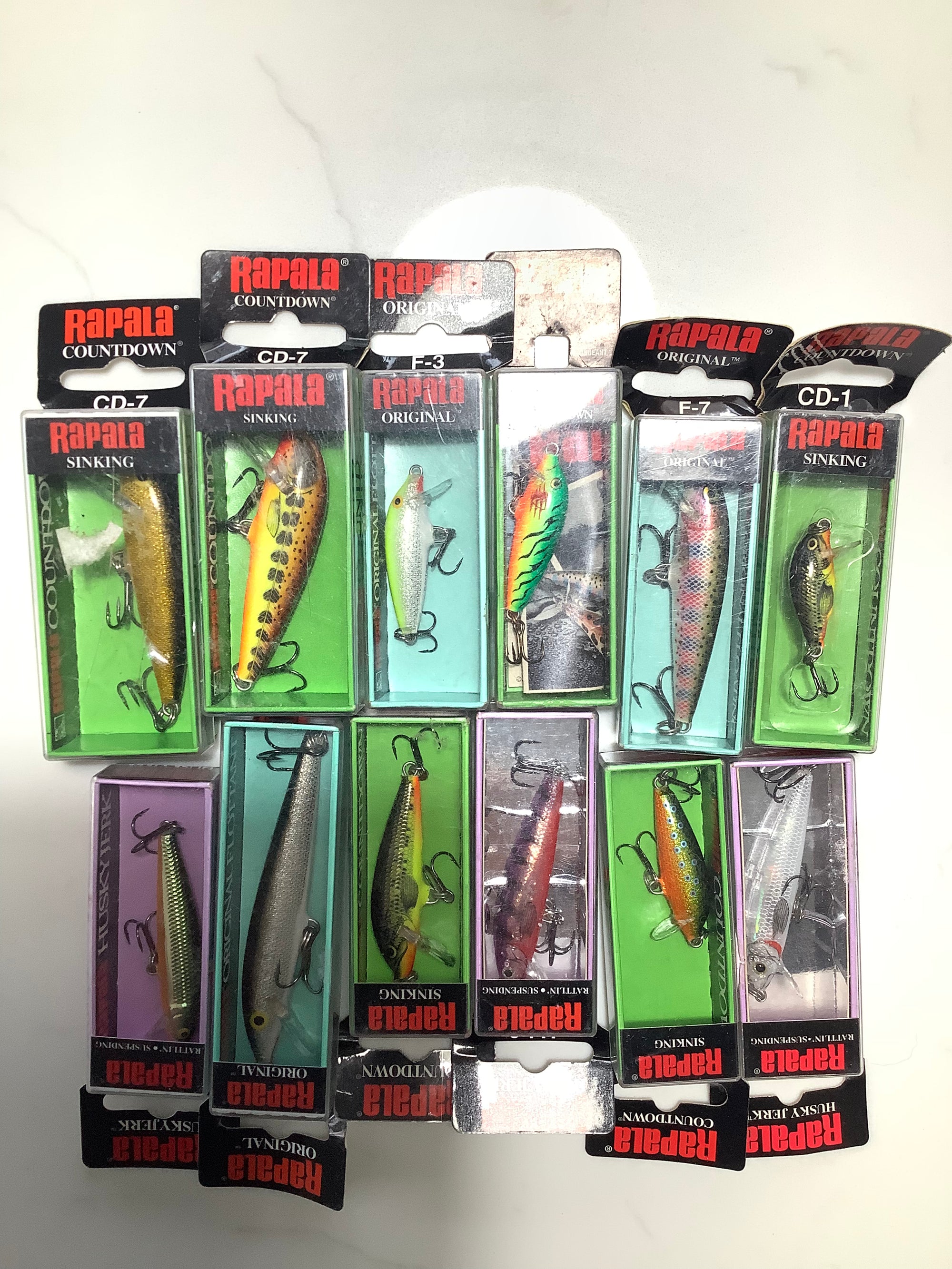 A selection of 12 x Mint unused RAPALA Lures
